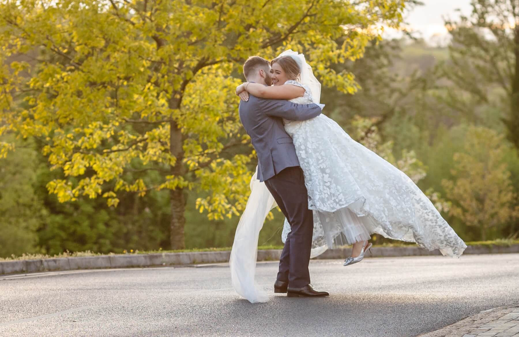Wedding couple laughing together, candid photography by Annette Burke 4Ever Photos