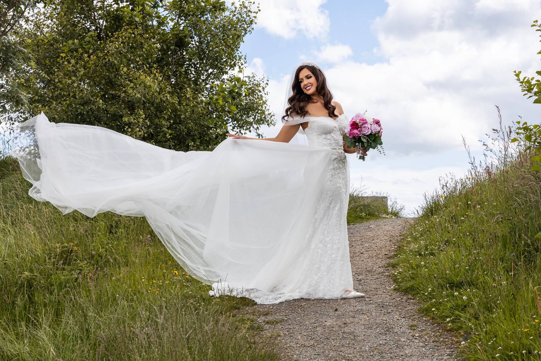 Happy bride and groom celebrating on their wedding day, Northern Ireland wedding photography by Annette Burke